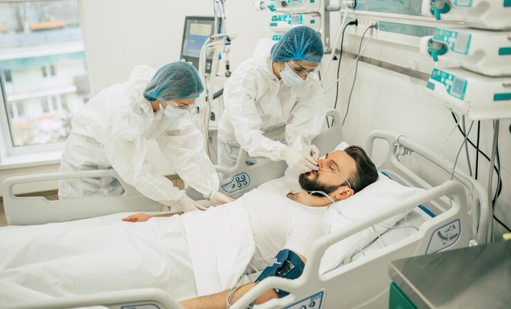 coronavirus covid 19 infected patient quarantine ward hospital with doctors protective suits while they making disease treatment him 283617 1662 2